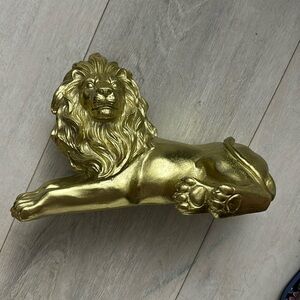 Antique style gold lion statue